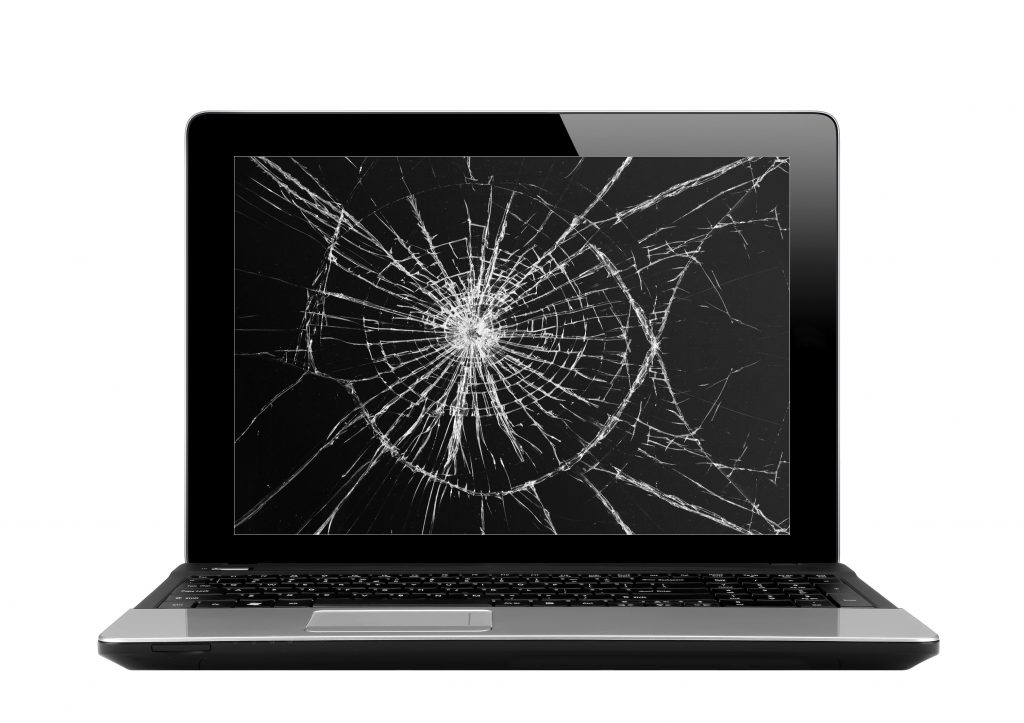 Black laptop with broken screen isolated on white background